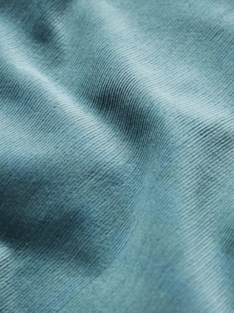 Load image into Gallery viewer, Close up of the Duck Camp Corduroy Shirt in the color Bering Sea.
